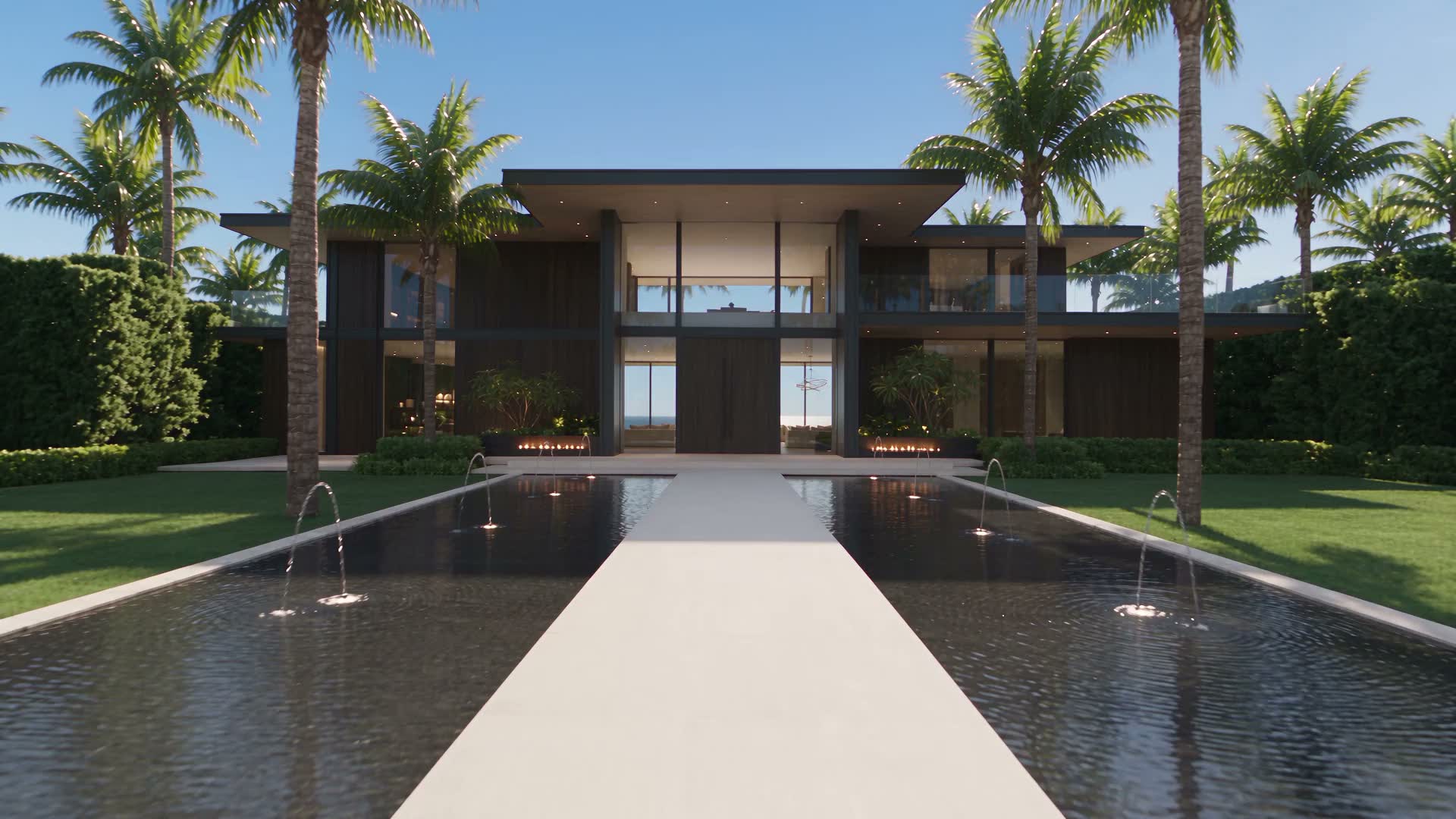 Entrance of a modern coastal estate, a reflecting pool with fountains and fire bowls leading to the front doors